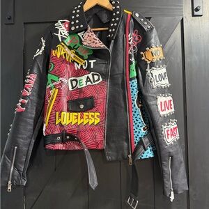 Studded Black Leather Jacket with Colorful Patches